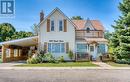 3070 Patrick Street, Howick, ON  - Outdoor With Balcony With Facade 