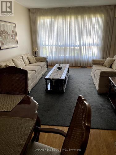 11 Langfield Crescent, Toronto (Mount Olive-Silverstone-Jamestown), ON - Indoor Photo Showing Living Room