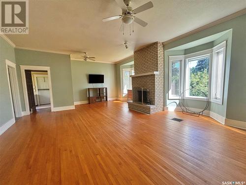 123 Crescent Lake Road, Saltcoats, SK - Indoor Photo Showing Living Room With Fireplace