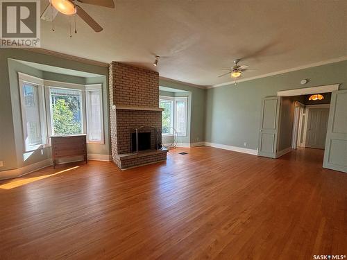 123 Crescent Lake Road, Saltcoats, SK - Indoor Photo Showing Living Room With Fireplace