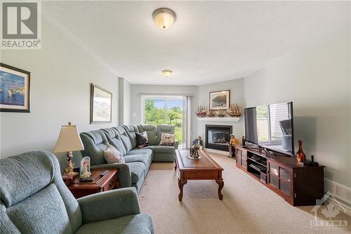 2233 Marble Crescent, Prescott And Russell, ON - Indoor Photo Showing Living Room With Fireplace