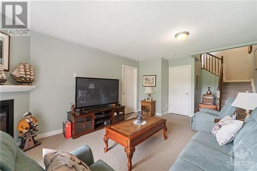 2233 Marble Crescent, Prescott And Russell, ON - Indoor Photo Showing Living Room With Fireplace