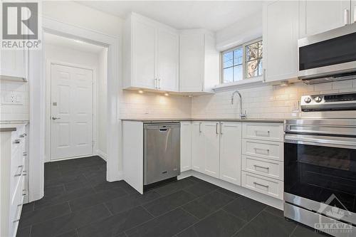 Bright White Kitchen - 41 Lambton Avenue, Ottawa, ON - Indoor Photo Showing Kitchen