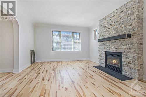 Living Room - 41 Lambton Avenue, Ottawa, ON - Indoor Photo Showing Living Room With Fireplace