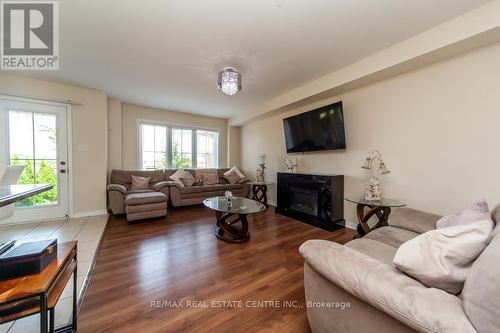 79 Sherway Street, Hamilton (Stoney Creek Mountain), ON - Indoor Photo Showing Living Room With Fireplace