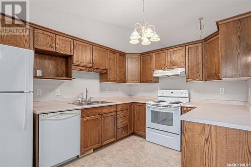 109 615 Mcwillie Avenue, Saskatoon, SK - Indoor Photo Showing Kitchen With Double Sink