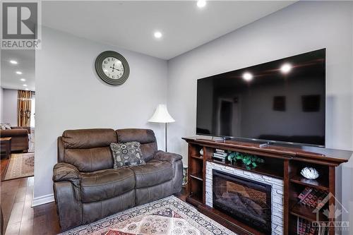 906 Cahil Drive W, Ottawa, ON - Indoor Photo Showing Living Room With Fireplace