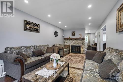 906 Cahill Drive W, Ottawa, ON - Indoor Photo Showing Living Room With Fireplace