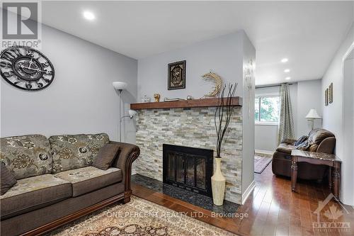 906 Cahill Drive W, Ottawa, ON - Indoor Photo Showing Living Room With Fireplace