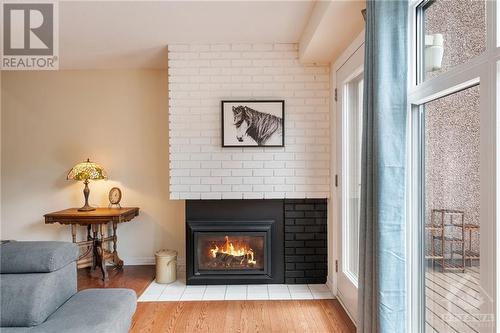 Gas Fireplace - 31 Reaney Court, Kanata, ON - Indoor Photo Showing Living Room With Fireplace