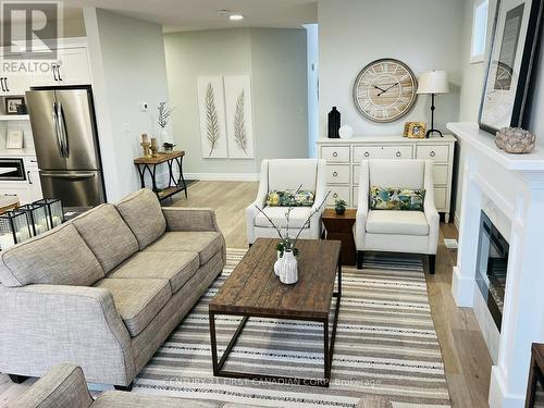 21 - 35 Old Course Road, St. Thomas, ON - Indoor Photo Showing Living Room With Fireplace