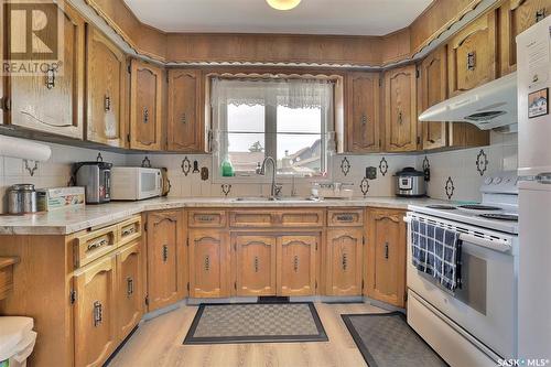 2604 Kliman Crescent, Regina, SK - Indoor Photo Showing Kitchen With Double Sink