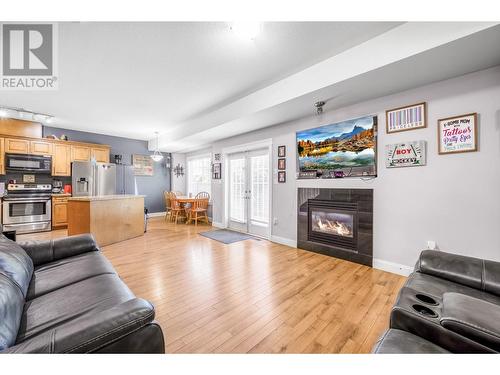 1096 Fairview Road Unit# 102, Penticton, BC - Indoor Photo Showing Living Room With Fireplace