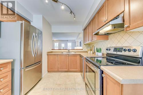 13 - 2189 Postmaster Drive, Oakville, ON - Indoor Photo Showing Kitchen With Double Sink