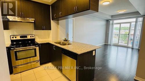 313 - 54 Sky Harbour Drive, Brampton, ON - Indoor Photo Showing Kitchen With Double Sink