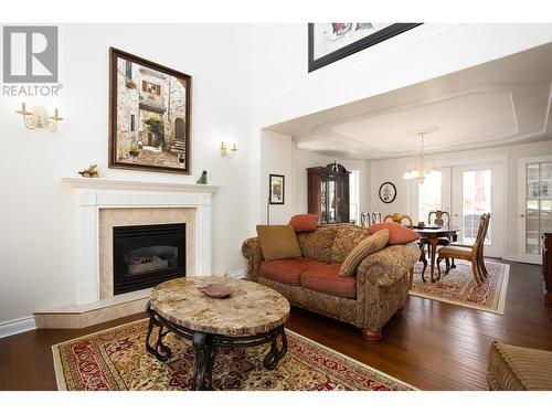 310 Woodcrest Court, Kelowna, BC - Indoor Photo Showing Living Room With Fireplace