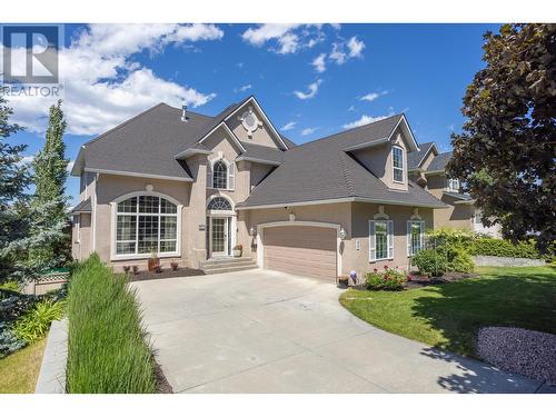 310 Woodcrest Court, Kelowna, BC - Outdoor With Facade