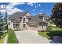 310 Woodcrest Court, Kelowna, BC  - Outdoor With Facade 