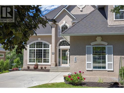 310 Woodcrest Court, Kelowna, BC - Outdoor With Facade