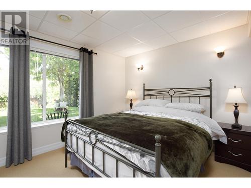 310 Woodcrest Court, Kelowna, BC - Indoor Photo Showing Bedroom