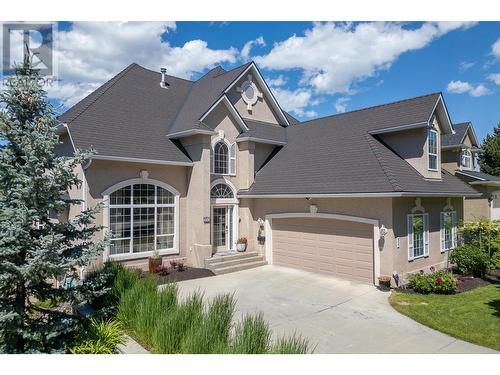 310 Woodcrest Court, Kelowna, BC - Outdoor With Facade