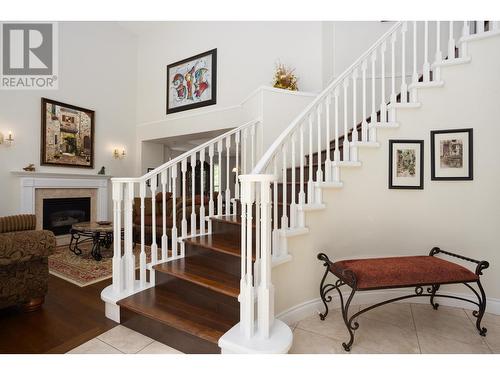 310 Woodcrest Court, Kelowna, BC - Indoor Photo Showing Other Room With Fireplace