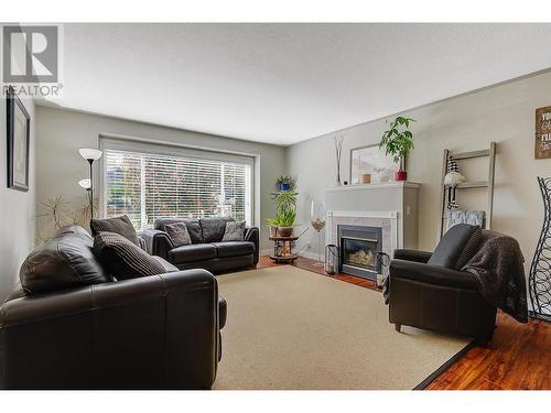 1862 Aitkins Court, Kelowna, BC - Indoor Photo Showing Living Room With Fireplace