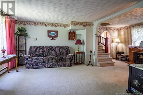 26 Tracy Street, Mcadam, NB - Indoor Photo Showing Living Room With Fireplace