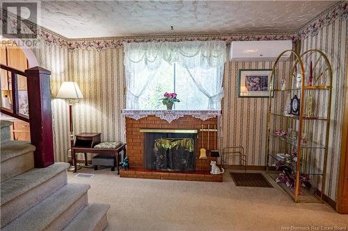 26 Tracy Street, Mcadam, NB - Indoor With Fireplace