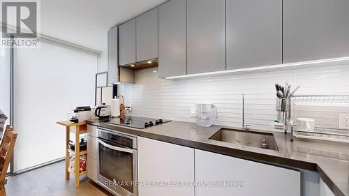 601 - 60 Colborne Street, Toronto (Church-Yonge Corridor), ON - Indoor Photo Showing Kitchen With Upgraded Kitchen