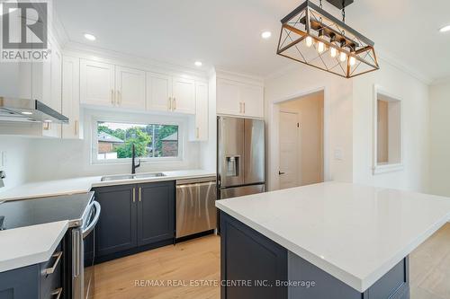 27 Garthwood Drive, Toronto (Kennedy Park), ON - Indoor Photo Showing Kitchen With Double Sink