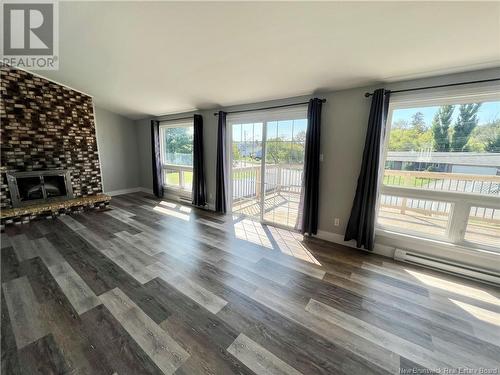 1079 Winton, Bathurst, NB - Indoor Photo Showing Living Room With Fireplace