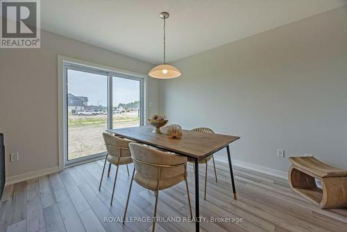 56 Silverleaf Path, St. Thomas, ON - Indoor Photo Showing Dining Room With Fireplace