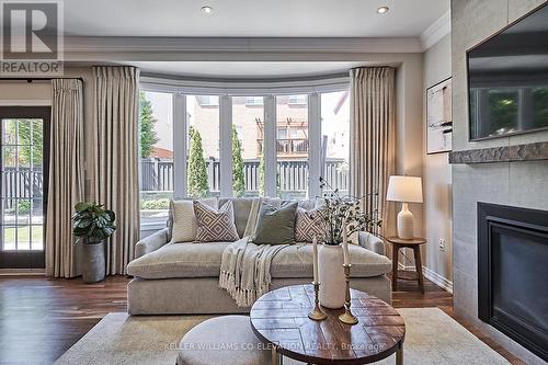 24 Rainbow Crescent, Whitby, ON - Indoor Photo Showing Living Room With Fireplace