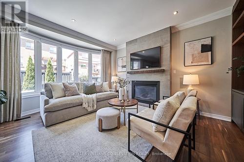 24 Rainbow Crescent, Whitby, ON - Indoor Photo Showing Living Room With Fireplace