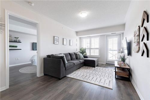 1045 Nadalin Heights|Unit #406, Milton, ON - Indoor Photo Showing Living Room