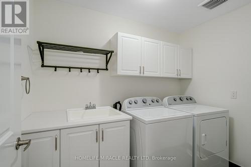 64 Fortis Crescent, Bradford West Gwillimbury, ON - Indoor Photo Showing Laundry Room