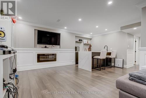 64 Fortis Crescent, Bradford West Gwillimbury, ON - Indoor Photo Showing Living Room With Fireplace