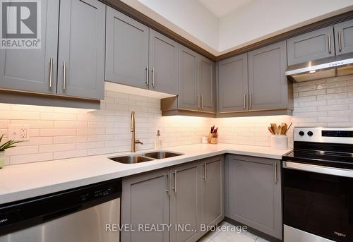 404 - 20 Koda Street, Barrie, ON - Indoor Photo Showing Kitchen With Double Sink