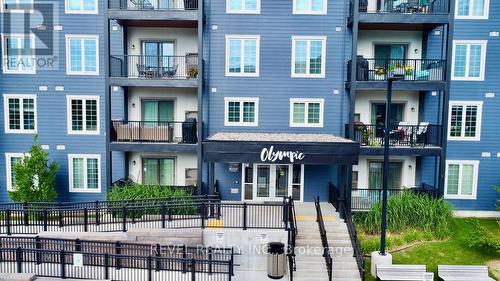 404 - 20 Koda Street, Barrie, ON - Outdoor With Balcony With Facade