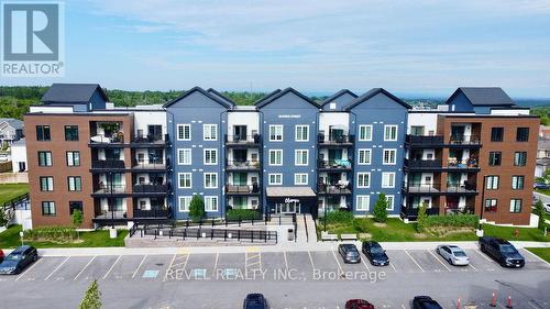 404 - 20 Koda Street, Barrie (Holly), ON - Outdoor With Balcony With Facade