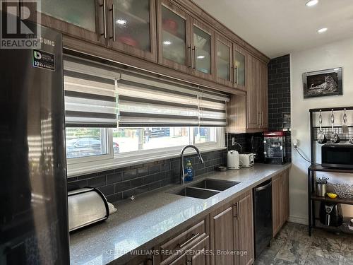 7648 Redstone Road, Mississauga (Malton), ON - Indoor Photo Showing Kitchen With Double Sink