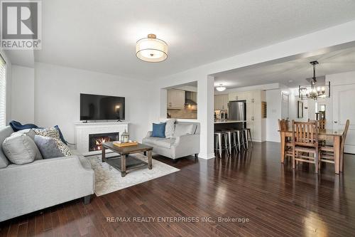 119 - 1035 Victoria Road S, Guelph (Village), ON - Indoor Photo Showing Living Room With Fireplace