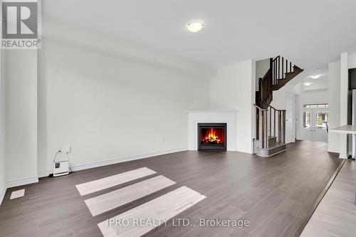 41 Povey Road, Centre Wellington (Fergus), ON - Indoor Photo Showing Living Room With Fireplace