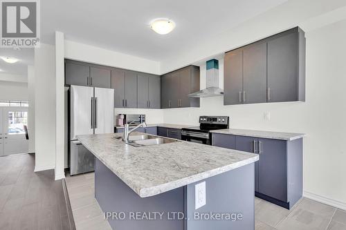 41 Povey Road, Centre Wellington (Fergus), ON - Indoor Photo Showing Kitchen With Stainless Steel Kitchen With Double Sink With Upgraded Kitchen