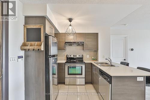 910 - 273 South Park Road, Markham (Commerce Valley), ON - Indoor Photo Showing Kitchen With Stainless Steel Kitchen With Double Sink With Upgraded Kitchen