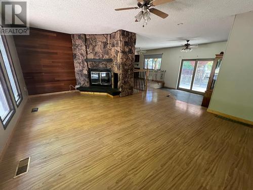 7286 12Th Street, Grand Forks, BC - Indoor Photo Showing Living Room With Fireplace