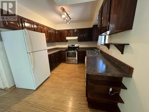 7286 12Th Street, Grand Forks, BC - Indoor Photo Showing Kitchen With Double Sink