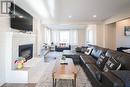 69 Lillian Place, Fort Erie, ON  - Indoor Photo Showing Living Room With Fireplace 