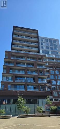 602 - 30 Baseball Place, Toronto (South Riverdale), ON - Outdoor With Balcony With Facade